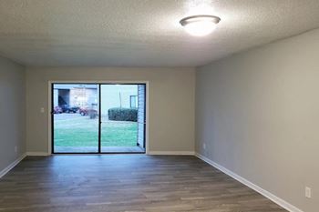Empty living room with a sliding door