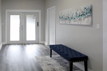 Living room with a blue bench