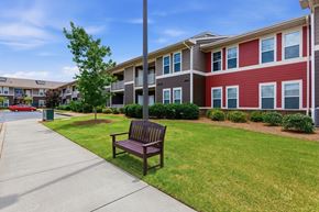 Huntsville apartment for rent - Bench in front of Lodge at Johns Road
