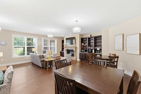 Huntsville apartment for rent - A dining room with a wooden table and chairs.
