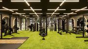 Jersey City apartment for rent - a gym with weights and other exercise equipment on a green floor