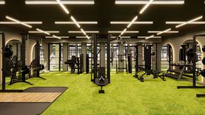Jersey City apartment for rent - a gym with weights and other exercise equipment on a green floor
