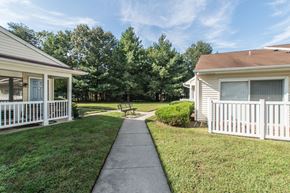 Waldorf apartment for rent - A sunny day at a residential area with houses and a clear sky.