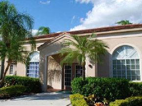 Lantana apartment for rent - Leasing Office Exterior with Trees and Shrubs Around Sidewalk