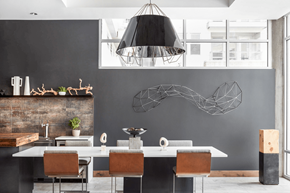 Denver apartment for rent - A modern dining room with a large table and chairs.