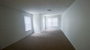 Clermont apartment for rent - Carpeted Living Room with three windows