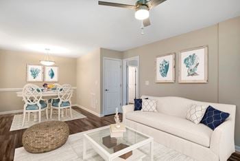 Multi-speed ceiling fans with lighting