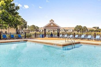 Waterfront resort-style pool with sundeck