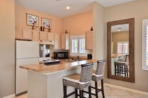 Vero Beach apartment for rent - Clubhouse Kitchen With Refrigerator at River Park Place Apartments, Vero Beach, FL, 32962