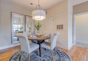 Concord apartment for rent - A dining room with a round table and chairs.
