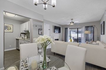 Boca Raton apartment for rent - A living room with a dining table and chairs.