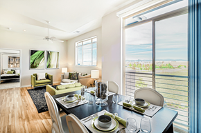 Denver apartment for rent - A modern dining room with a view of the outdoors.