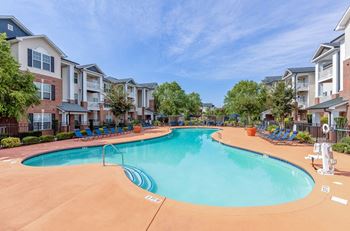 Resort style pool with sun deck