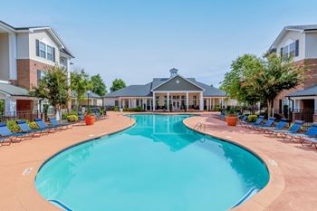Resort style pool with sun deck