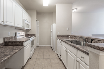 Fully-equipped kitchens with side-by-side refrigerator
