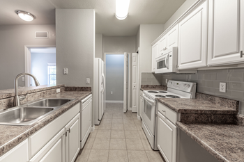 Fully-equipped kitchens with side-by-side refrigerator