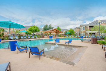Resort-style swimming pool with sundeck