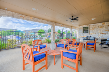 Outdoor lounge with fireplace