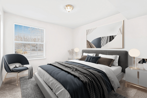 High Point apartment for rent - Virtually staged bedroom. Carpeted bedroom with grey and tan accent bed/artwork. Large window in background.