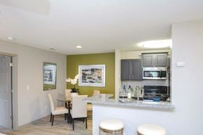 Gastonia apartment for rent - A kitchen with a table and chairs in it.