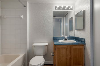 Tiled shower area with bathtub
