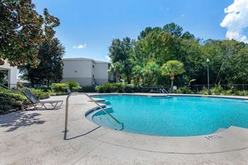 Large swimming pool with sun deck