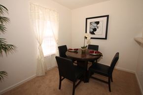 Virginia Beach apartment for rent - Model Dining Room  with Dining Table Next to Window and Decorations