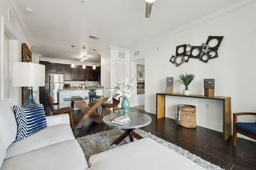 Orlando apartment for rent - A living room with a white couch and a coffee table.