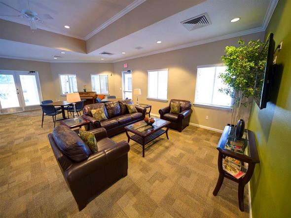 Jacksonville apartment for rent - Clubhouse Lounge With Large Windows at Leigh Meadows Apartments, Jacksonville, FL, 32257