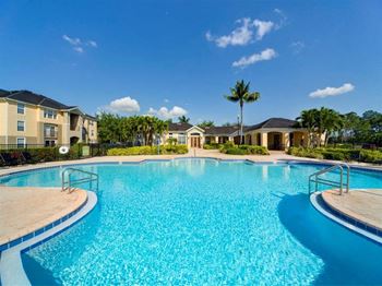 Lakeside pool with sundeck seating