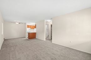 Waldorf apartment for rent - A room with a carpeted floor and a ceiling fan.