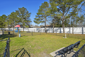 Jacksonville apartment for rent - a view of a park with trees and a fence