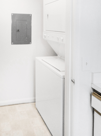 Full-sized washer and dryer provided