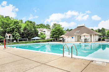 Swimming pool with tanning deck