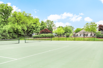 Fenced-in tennis court
