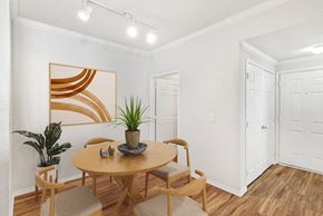 Nashville apartment for rent - A dining room with a wooden table and chairs.