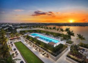 West Palm Beach apartment for rent - a rendering of a pool at sunset overlooking the city