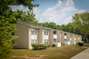 Waldorf apartment for rent - Apartment building surrounded by trees and grass