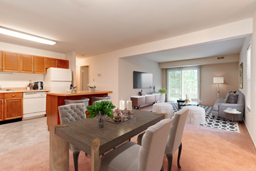 Waldorf apartment for rent - A modern kitchen with a dining table and chairs.