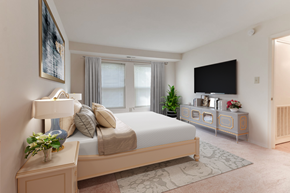 Waldorf apartment for rent - A virtual staged bedroom with a large window, and carpeted floors.