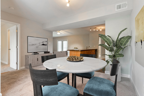 Raleigh apartment for rent - staged dining room with carpeted flooring at Central on the Green Apartment Homes, North Carolina, 27604