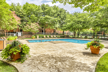 Two swimming pools with sundeck spas