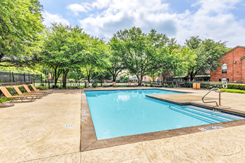 Two swimming pools with sundeck spas
