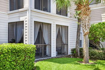 Screened-in patio with chef-inspired grill