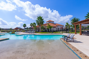 Resort-style swimming pool with sundeck