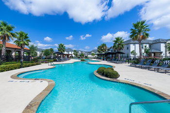 Resort-style swimming pool with sundeck