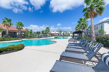 Resort-style swimming pool with sundeck