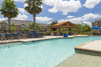 Resort-style swimming pool with sundeck