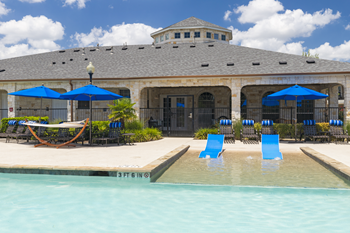 Resort-style swimming pool with sundeck