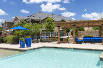 Resort-style swimming pool with sundeck